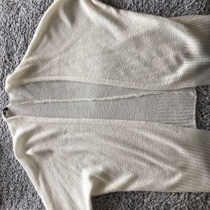 cream colored cardigan